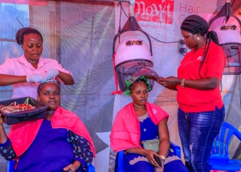 Movit treating Mbarara Trade Show visitors to free full hair makeovers (PHOTO /Courtesy)