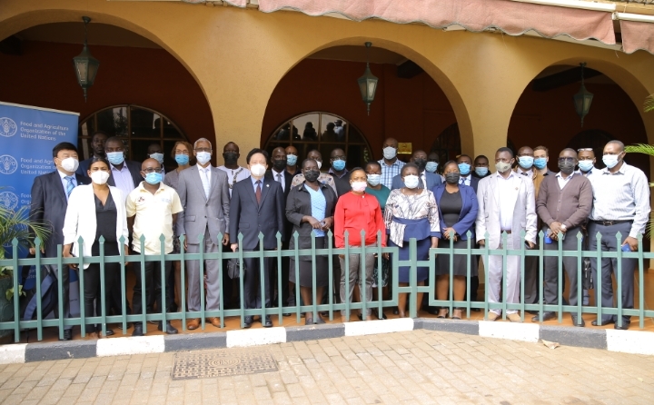 Workshop participants pose for a group photo after the opening ceremony at Speke Hotel in Kampala. Front row third from left – right): Antonio Querido- FAO Representative in Uganda and Ye Anping- Director, Division for South-South and Triangular Coopération, FAO Rome.