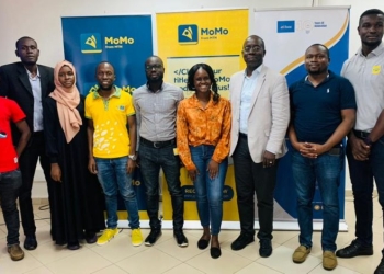 The MTN MoMo team lead by Stephen Mutana the Chief regulatory & administation officer and the Outbox team lead by Richard Zulu Team leader