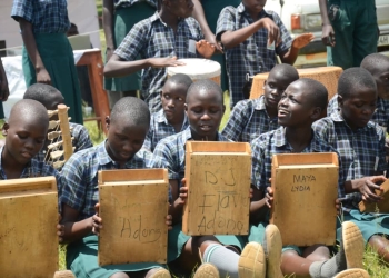 "Wakadogo performers doing Aguma music and dance. Aguma is done to show happiness and celebration in Acholi"