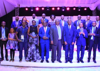 Winners holding their awards in a goup photo with ICPAU leadership on Friday evening at Imperial Resort Beach in Entebbe