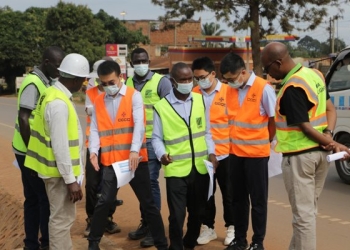 UNRA and CCCC officials inspect some of the works on the 22 kilometre Kibuye-Entebbe Road that has been under refurbishment since August last year (PHOTO /Courtesy)