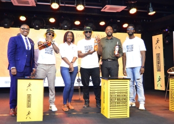 Right: NBS's Desire Derekford Mugumisa, DJ Roja, Johnnie Walker Brand Manager Christine Kyokunda, DJ Slick Stuart, UBL's Reserve Brand Ambassador Agaba Tumusiime and Eventrix rep Isram posing for a group photo at the press conference on Monday.