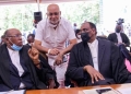 Mr. Sudhir and his lawyers from the Kampala Associated Advocates at an earlier court hearing. (PHOTO/File).