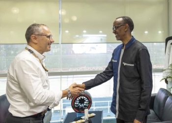 President Paul Kagame meets with Stefano Domenicali, Chief Executive of Formula One Group, at the Marina Bay Street Circuit, in Singapore on Sunday, October 2 (PHOTO/Presidency)
