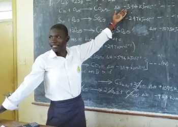 A teacher explains to learners. Education Ministry says it will sponsor upto 8000 upgrading teachers