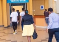 The University of Rwanda employees and students arriving that Campus premises. The government has taken a bold decision to adjust the time staff report to work from 07a.m to 09a.m (PHOTO/NEW TIMES)