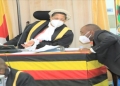Hon. Medard Sseggon consulting Speaker Anita Among during plenary on Wednesday, 23 November 2022 (PHOTO/Courtesy)