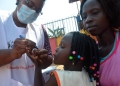 A child's finger is marked after receiving a polio vaccine in Kampala, Uganda, on Jan. 14, 2022. (Xinhua/Nicholas Kajoba)
