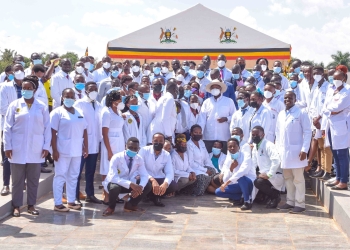 Medical workers take a group with the President during the Youth Symposium at Kololo ceremonial grounds on 3rd December 2022. ( PPU/Tony Rujuta)