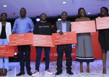 Agro Supply Limited (3rd L), the winner of the last set of winners in the UG Needs More of You Campaign having a photo moment with other winners at the unveiling of the last set of winners in the UG Needs More of You Campaign.