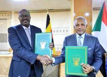 Vincent Bagiire, the Permanent Secretary, the Ministry of Foreign Affairs and Head of Uganda's Delegation (L) with Daffa'alla Al- Haj Ali the Under Secretary at the Ministry of Foreign Affairs of Sudan (PHOTO/Courtesy)