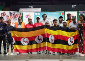 Team Uganda display the Ugandan flags at Dakar arean in senegal on Sunday