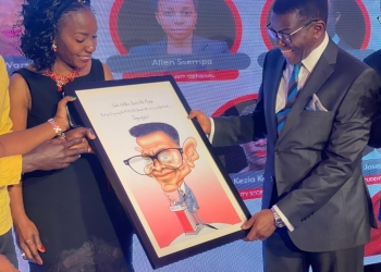 The Katikkiro of Buganda, Owek. Charles Peter Mayiga receiving a token of appreciation from the PRAU Governing Council led by Stephen Mwanga (PHOTO/Courtesy)