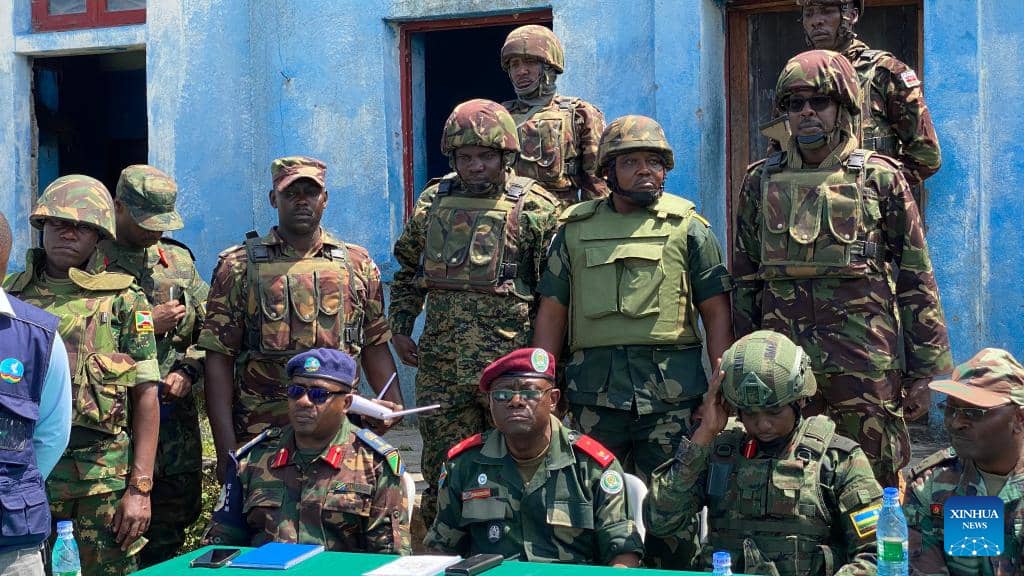 Photo taken on Jan. 6, 2023 shows a press conference held by the regional force of East African Community (EAC) and rebels of the March 23 Movement (M23) at Rumangabo, the Democratic Republic of the Congo (DRC). Rebels of the March 23 Movement (M23) on Friday officially handed over the Rumangabo military base they seized in the northeastern Democratic Republic of the Congo (DRC) in October 2022, to the military force of East African Community (EAC).