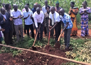 Jinja Uganda Stake President Moses N. Mbiro, center, helps break ground for a new primary school in Buwagi Uganda, Dec. 2, 2022. The Church of Jesus Christ of Latter-day Saints