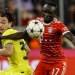 Inter’s Matteo Darmian (L) in action against Munich's Sadio Mane during the UEFA Champions League group C soccer match between Bayern Munich and Inter Milan in Munich, Germany, 01 November 2022.  EPA/RONALD WITTEK