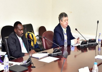 Former NSSF MD, Richard Byarugaba (L) appearing before the committee investigating the fund
