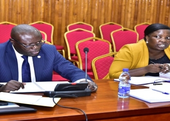 Nansasi (R) said the loan to the tiles company was illegal. On her right is URBRA CEO, Nsubuga
