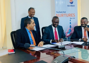 Mr. Tsehay Shiferaw, the Awash Bank Chief Executive Officer (left) and Mr. Joseph Kiiza Ndiho, the Service Cops’ Executive Chairman, exchange signed MoUs to roll out Service Cops’ instant micro-loans solution and a portfolio of other digital finance products