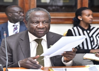 Matia Kasaija appearing before the committee