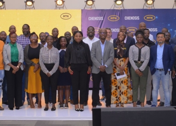 Group photo moment with some of the guests and members of MTN Uganda's EXCO team to celebrate the successful launch of 'MTN API as a service'