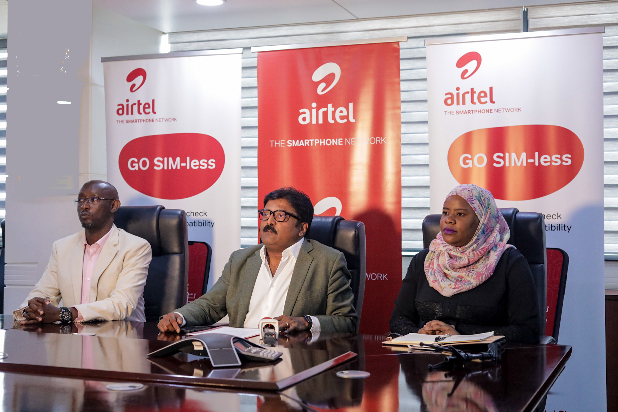 Airtel Uganda Managing Director, manoj murali (C), David Birungi, (L) Manager Public Relations & Corporate Communications at Airtel Uganda and Airtel Uganda’s Head of Data, Devices, and New product development, Joweria Nabakka ( R) during the launch of eSIM (embedded SIM) – a digital SIM that enables customers to access the same functionality as someone using a physical SIM at Airtel Uganda Offices at Clement Hill, today 12th May 2023