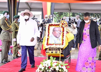 President Yoweri Museveni and his wife Janet Museveni after laying a wreath