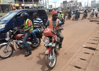 Some of the motorcyclists in Nateete traffic lights junction. ( Photos by Nteza Michael)