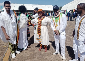 Some members of the Ethiopian Community in Uganda with H.E Etsegenet Yimenu at Kololo Air strip in Kampala on Thursday.