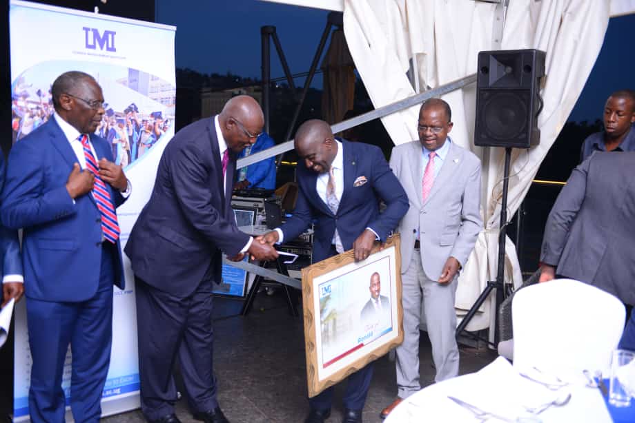 UMI chancellor and former Chief Justice Bart Katureebe who handed Mivule the token of appreciation commended him for the selfless service to the institution during his tenure as President of the alumni body and member of the governing council.