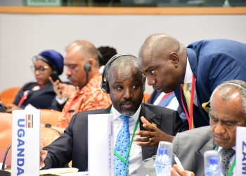 Deputy Speaker of Parliament Thomas Tayebwa and Sheema Municipality MP (NRM) Dickson Kateshumbwa during a parliamentary sitting in Brussels (PHOTO/Courtesy).