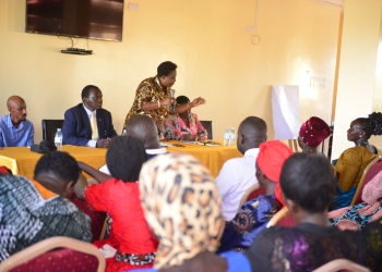 Minister Amongi addressing women leaders at Northern Gateway Hotel in Oyam