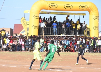 Bunhole players (in green jerseys) playing against Bukooli Namayingo players (in black jerseys) at Bwondha Primary School playground in Mayuge district on August 20th.