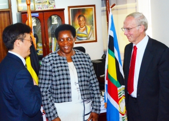 Jinman, Mutuuzo and Caprara after the meeting in Kampala on Tuesday