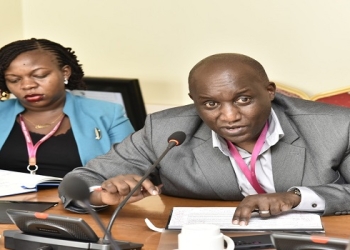 Karamagi (R) said they staff were laid off due to funding gaps