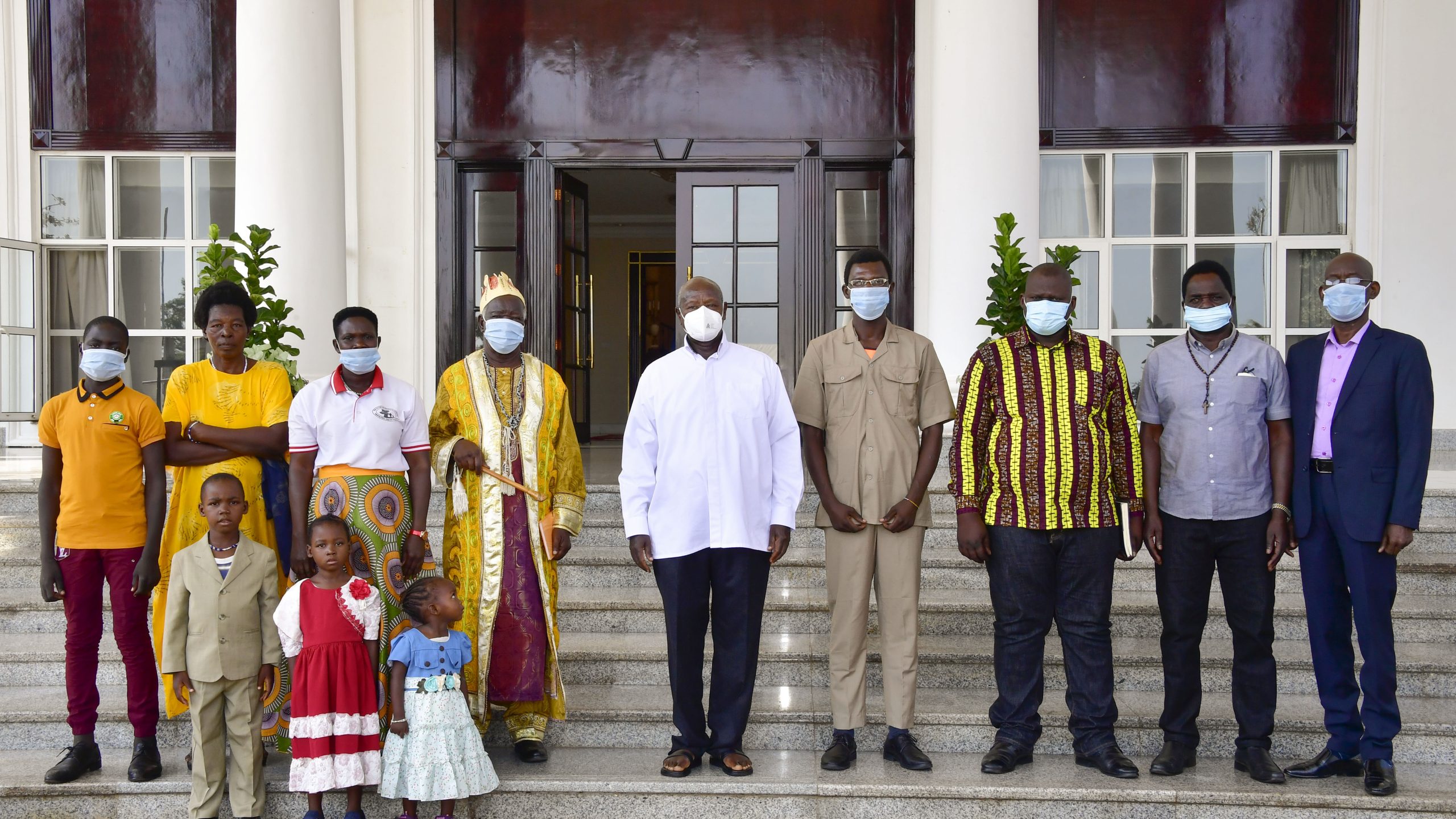 President Museveni poses for a photo with some of the family members of LRA's Joseph Konyi including one of his sons. This was after a meeting at State House Entebbe on Friday (PHOTO/Courtesy)