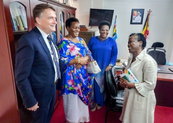 Saunders, Ministers Mutuuzo and Amongi and Namondo share a light moment after the meeting