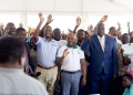 1500 SKILLED: Hon. Dr. Peter Teko Lokeris Minister of State for Mineral Development (in suit) officiated a graduation of 1500 farmers in Buliisa district who learned skills in post harvest processes, enterprise development and financial literacy organized by Pure Grow Africa.
