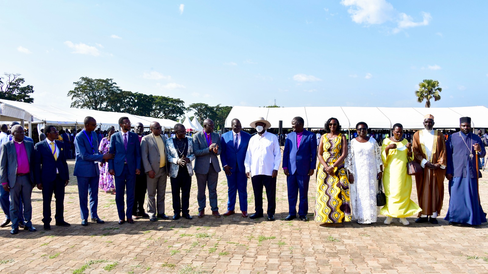 President Museveni, Pastor Patience Rwabwogo and other members of the clergy pose for a photo during the Light up Acholi land for Jesus Mission 2023 at Kaunda Grounds in Gulu on Saturday. PPU Photo (4)