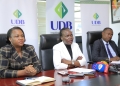 Patricia Ojangole (C) Managing Director, Uganda Development Bank, Elizabeth Muhebwa (L) Executive Director, Uganda National Association of Building and Civil Engineering Contractors, Eng. Andrew Muhwezi (R) President, Uganda Institute of Professional Engineers during a press conference where UGX 150 billion was earmarked for Ugandan Contractors to provide affordable and patient financing to aid contractor performance and growth. This was at the UDB Head office in Nakasero on 2nd October 2023.