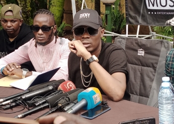 Singer Big Eye addressing the press at Munyonyo on Tuesday.