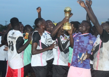 Padyere county team players celebrate their win after beating Okoro in penalities .photo by patrick okaba.