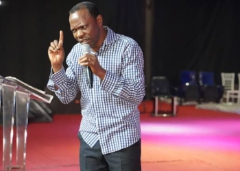 Pastor Jackson Ssenyonga preaching at Christian Life Church earlier on . (Courtesy photo)