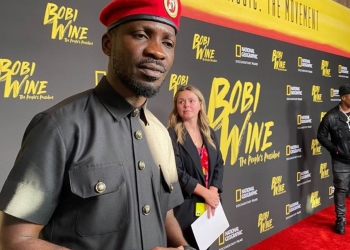 Ugandan musician turned politician Robert Kyagulanyi aka Bobi Wine, is arrested by police on his way to a press conference to announce the cancelation of his show at Busabala, Uganda, on April 22, 2019. Bobi Wine’s film ‘The People’s President’ over the weekend won the prestigious Audience Choice Award at the 17th annual Cinema Eye Honors, which took place at New York Academy of Medicine in East Harlem.