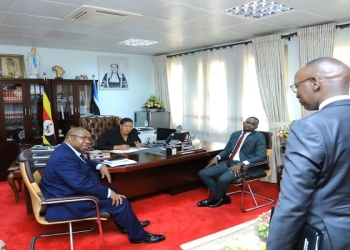 PARLIAMENTARY COMMISSION: Speaker Anita Among (second left), meeting with the Leader of the Opposition, Hon. Joel Ssenyonyi (R); the Government Chief Whip, Hon. Hamson Obua (standing); and the Clerk to Parliament, Adolf Mwesige Kasaija (L), on Tuesday, 09 January 2024 in her office at Parliament