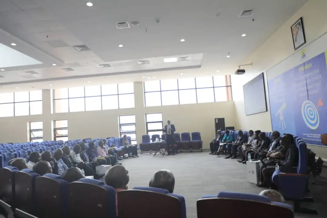 URA officials during a meeting with traders