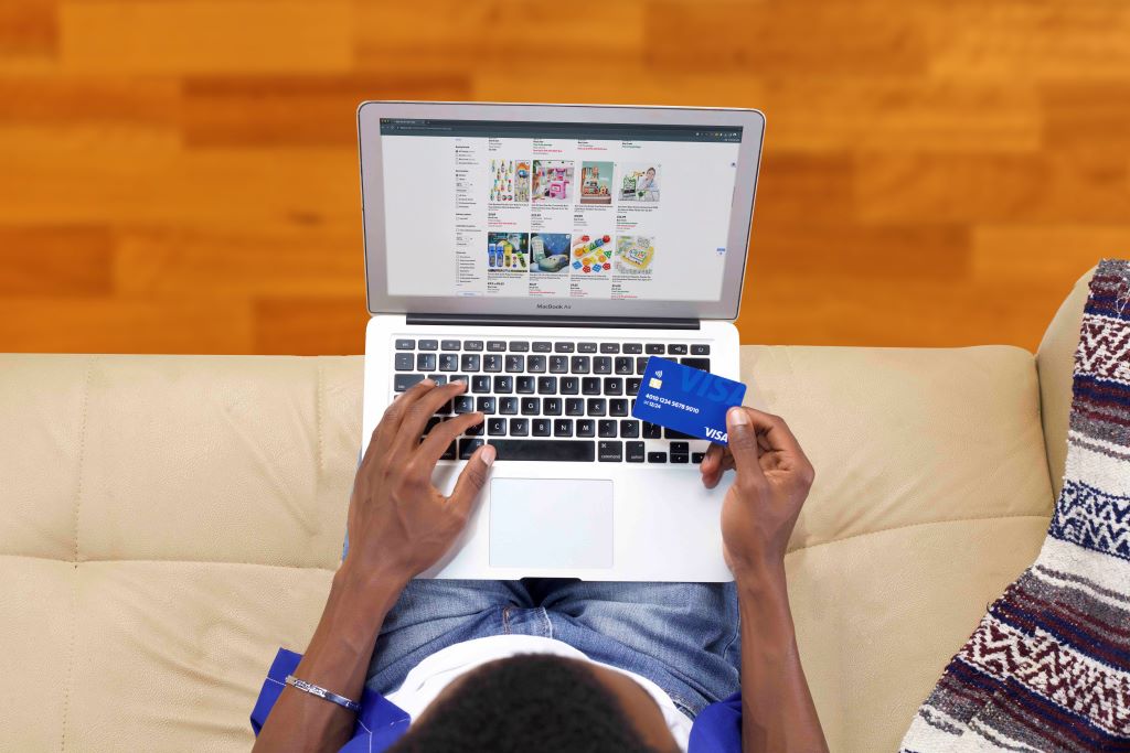 A Visa cardholder finalising his online transaction