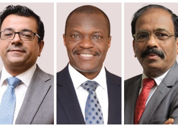 L-R Mr. Azim Kassam, the DTBU Board Chairman, Godfrey Sebaana the incoming CEO and MD and Mr. Varghese Thambi, the outgoing bank CEO