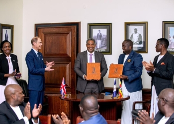 William Blick, Chairman Board of Trustees signed on behalf of the Program - Uganda Chapter and Omuk. Sebuwufu Roland - Chief Executive, Buganda Investments and Commercial Undertakings signed on behalf of Buganda Kingdom.